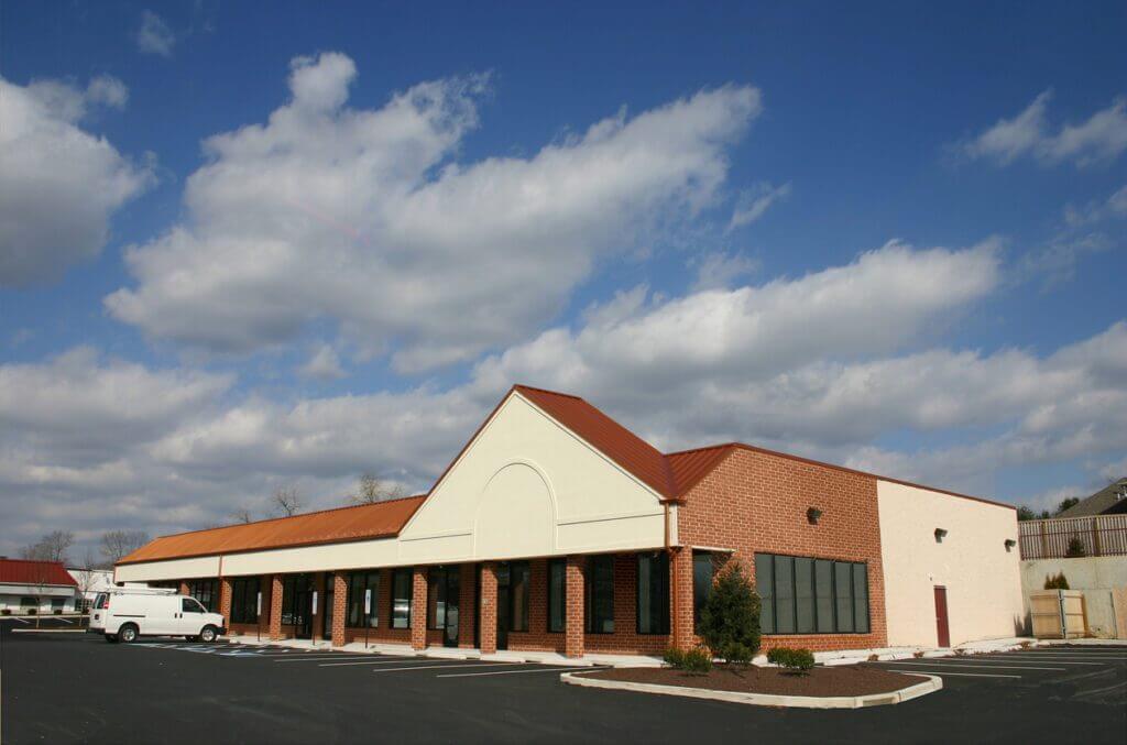 Flat vs. Sloped Commercial Roof Systems